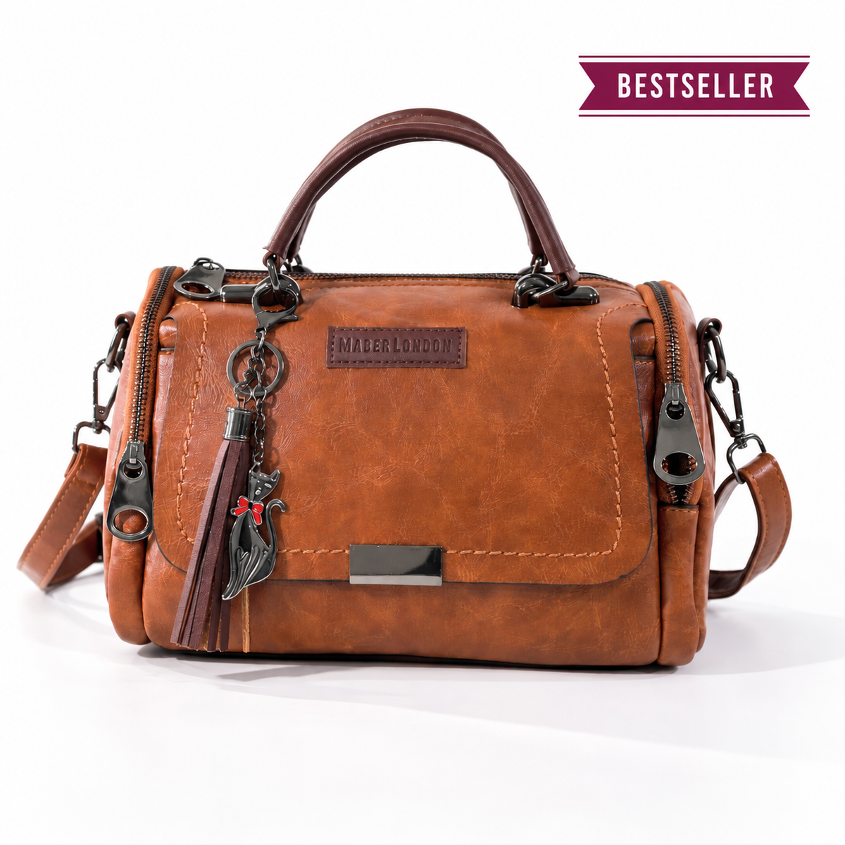MaberLondon coffee-brown handbag with top handle, shoulder strap and tassel charm, shown with a Bestseller badge.